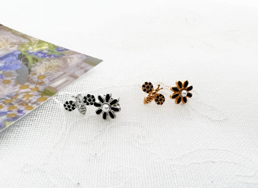 Black cubic setting tiny honey bee and daisy flower earrings