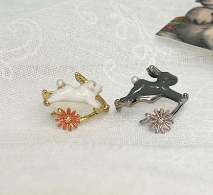 Cute hopping rabbit jumps above flower and branch Wrap adjustable Ring in 2 colors