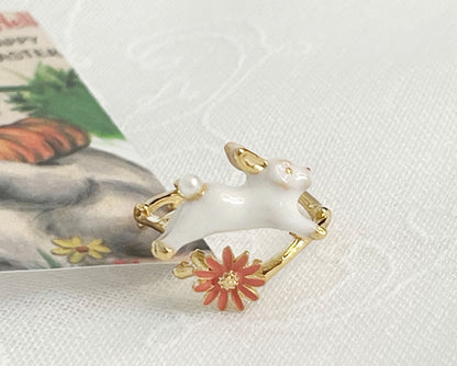 Cute hopping rabbit jumps above flower and branch Wrap adjustable Ring in 2 colors