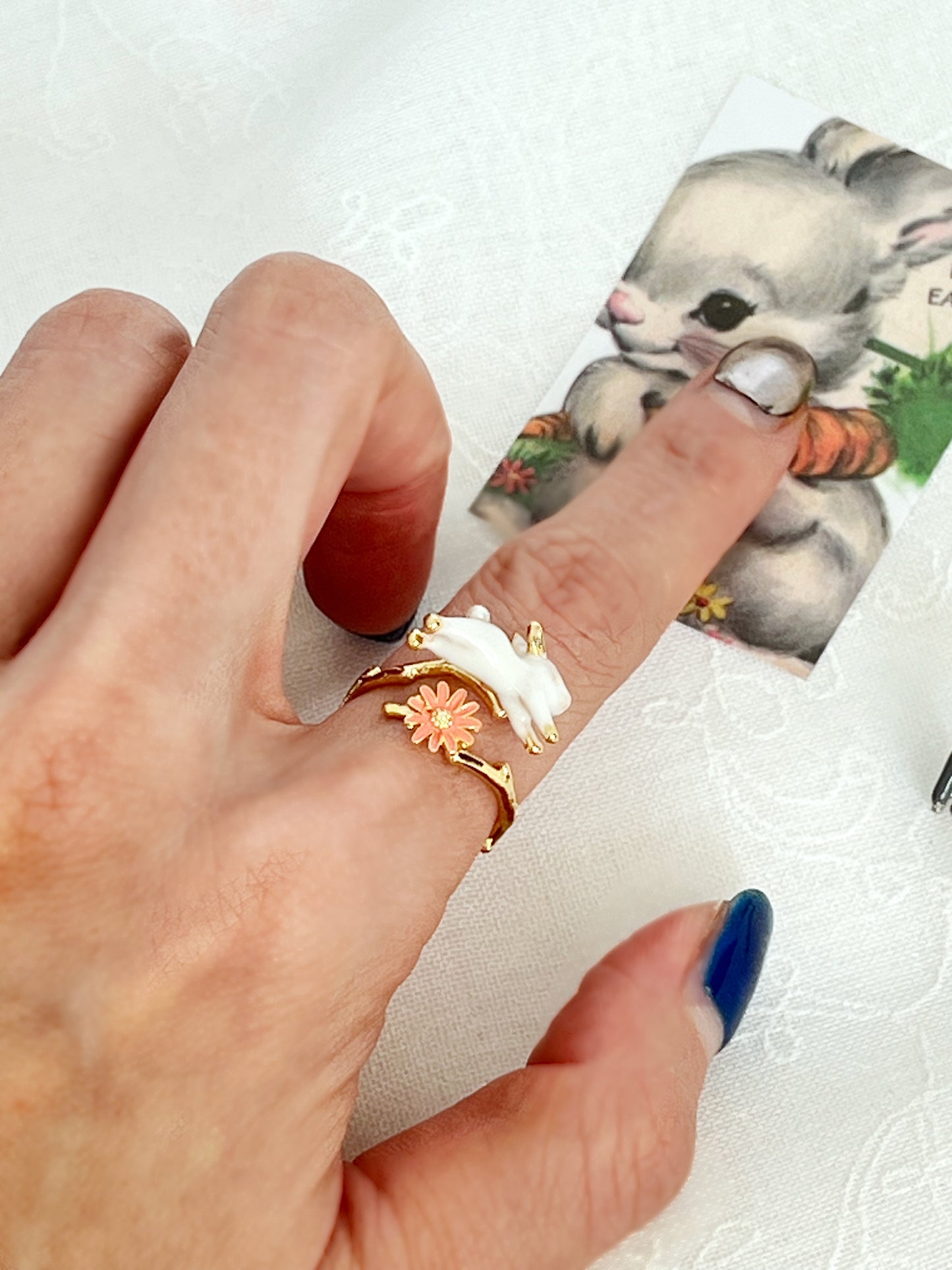 Cute hopping rabbit jumps above flower and branch Wrap adjustable Ring in 2 colors