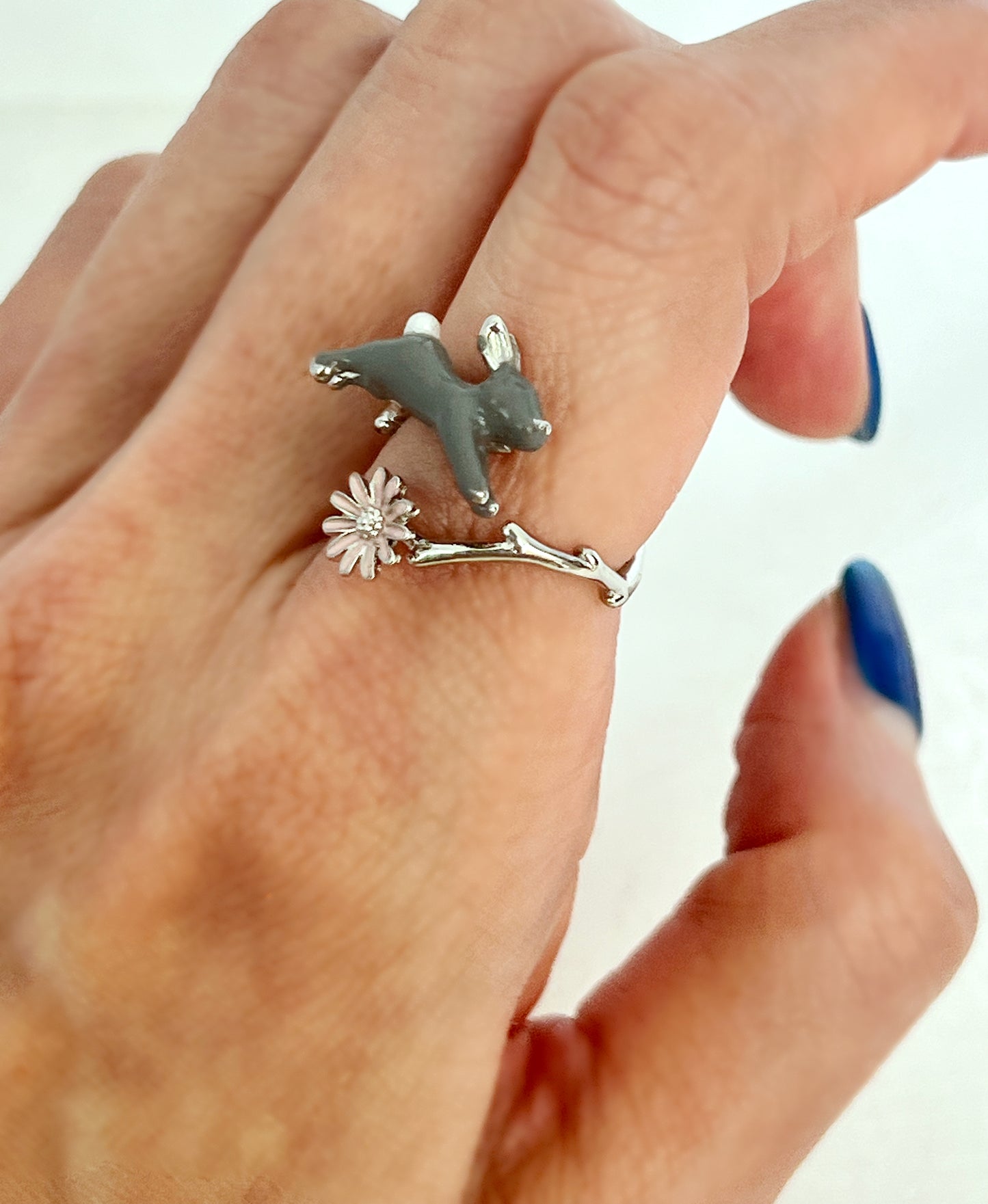 Cute hopping rabbit jumps above flower and branch Wrap adjustable Ring in 2 colors