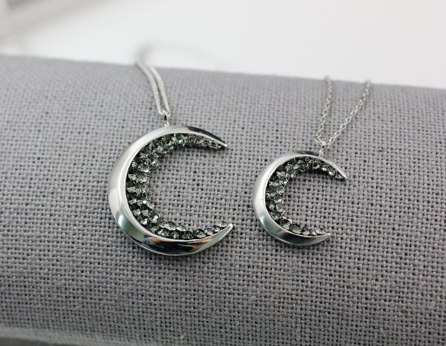 Crescent moon pendant Necklace detailed with Black Diamond Crystals