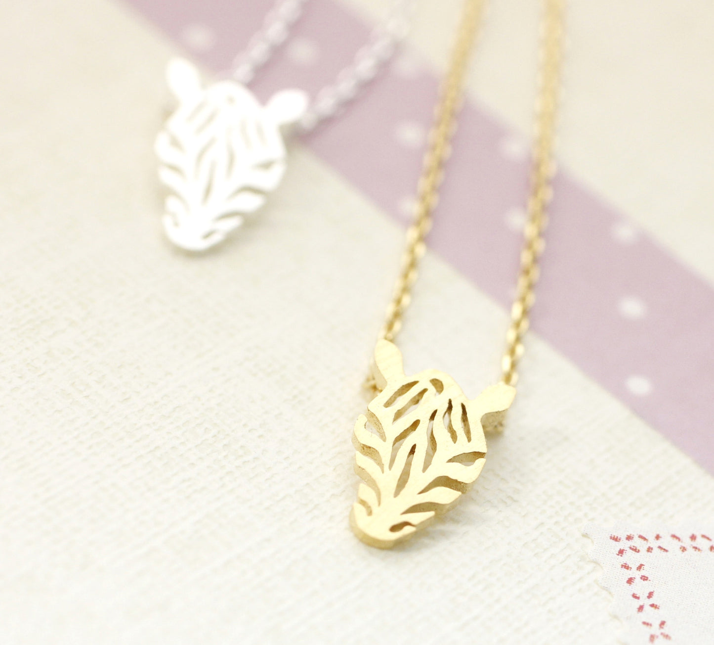 Cut-out Zebra Pendant Necklace in gold / silver